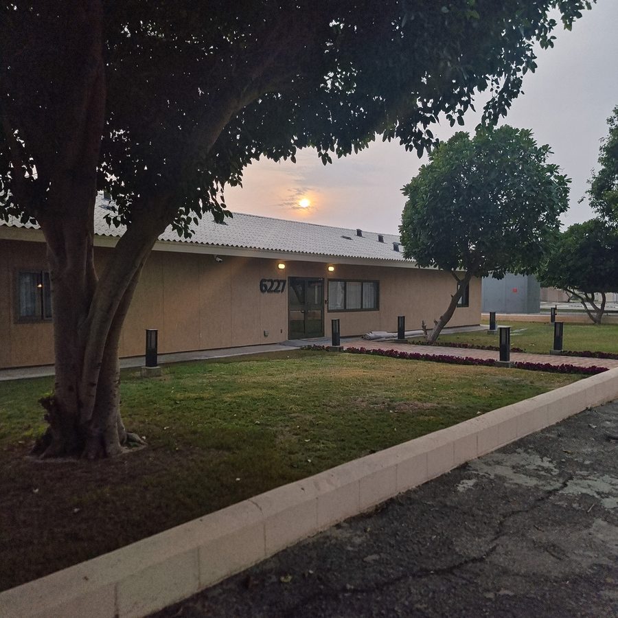 A compound villa at dusk