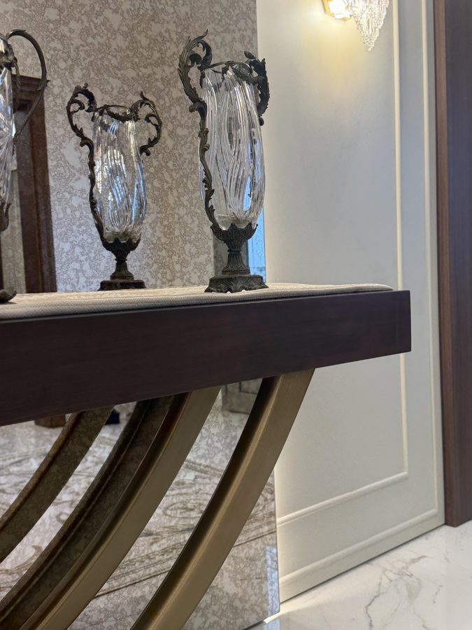 Console with glass vases