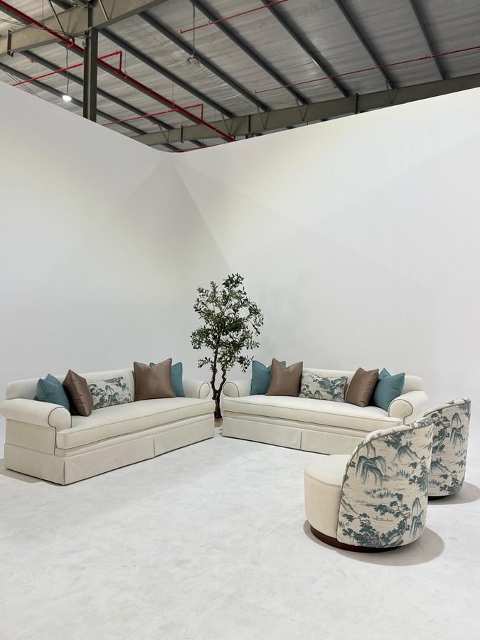 Ivory sectional with toile swivel chairs