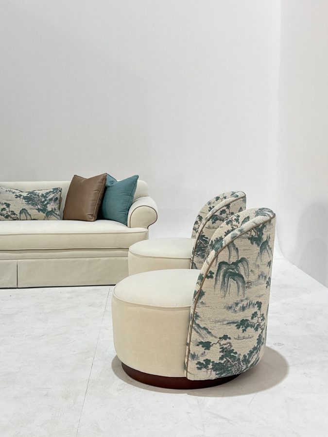 Toile swivel armchair