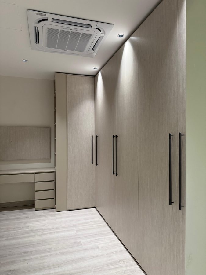 Full-height wardrobes in stone grey