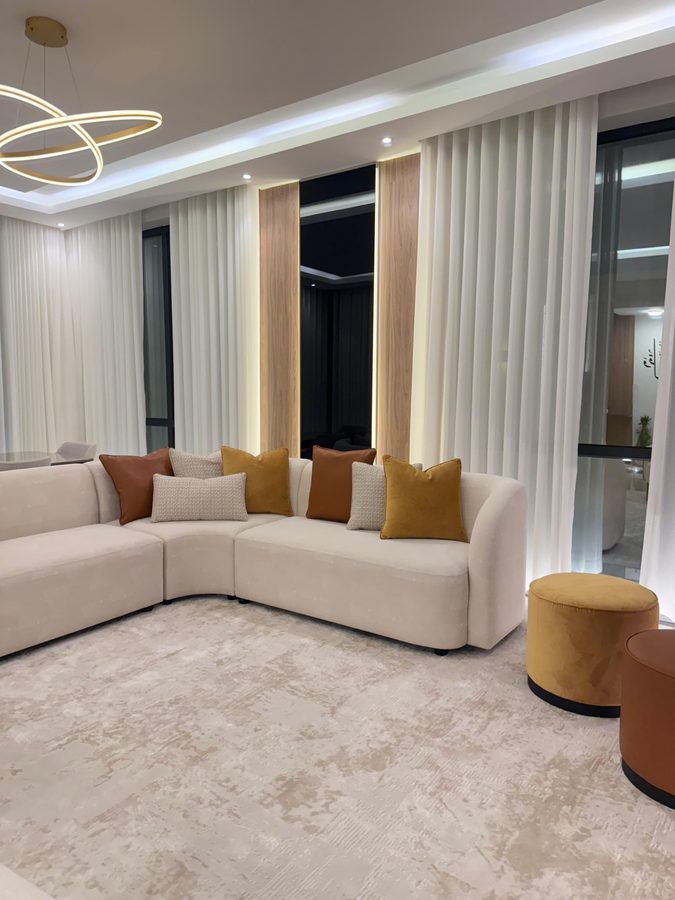 Modern majlis with mustard cushions