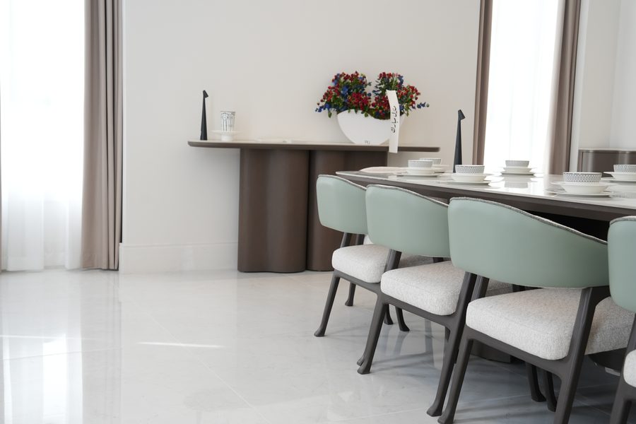 Dining room with sage chairs