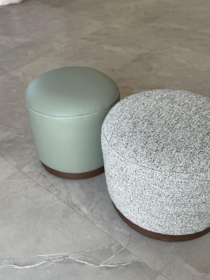 Leather and bouclé poufs
