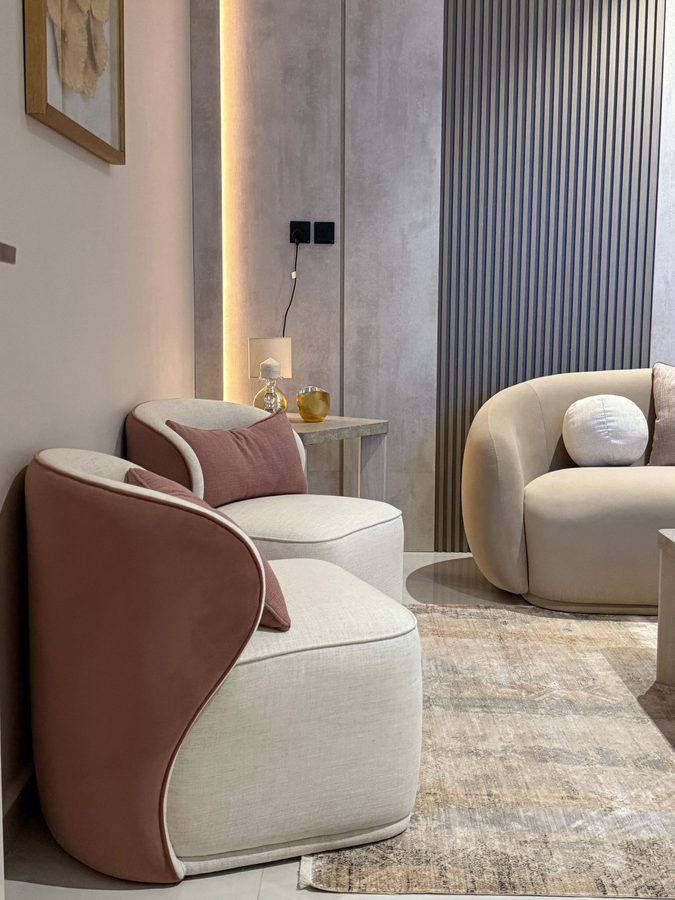 Blush-and-cream armchair