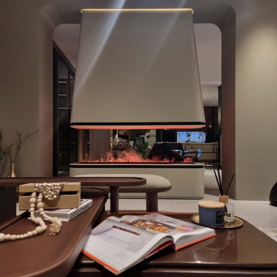 Suspended fireplace hood with coffee-table styling