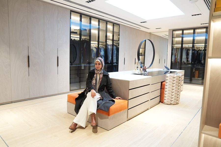 Farah seated in the finished dressing room