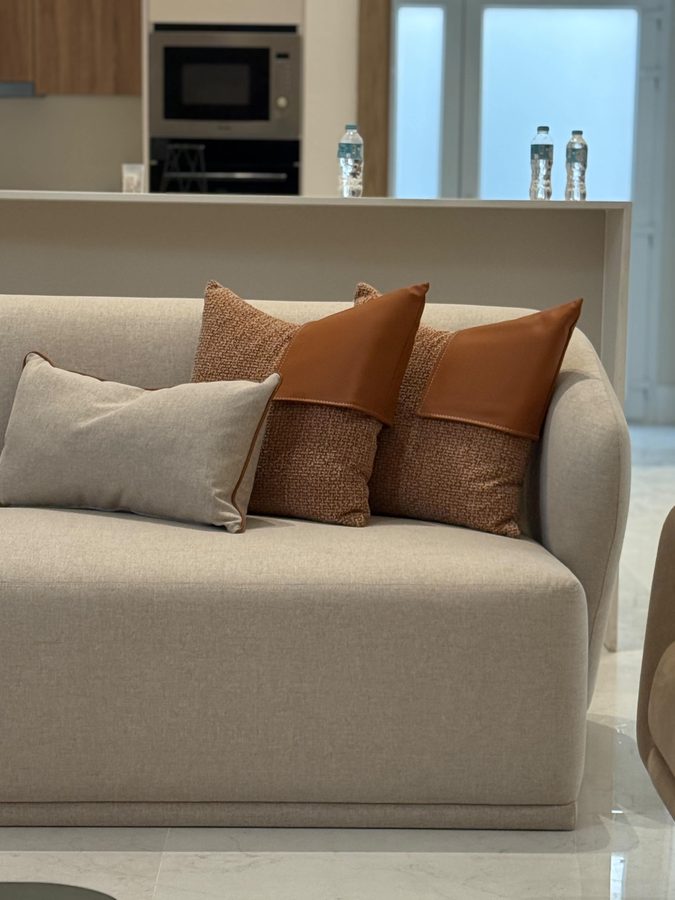 Sofa with terracotta leather cushions