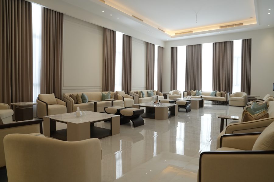 Long majlis with full-height curtains