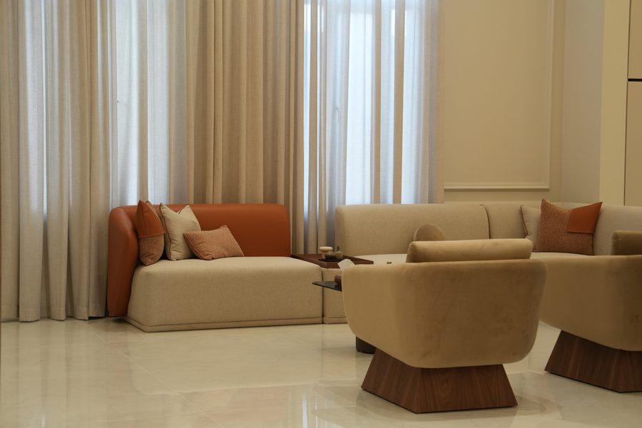 Living area with terracotta and cream seating