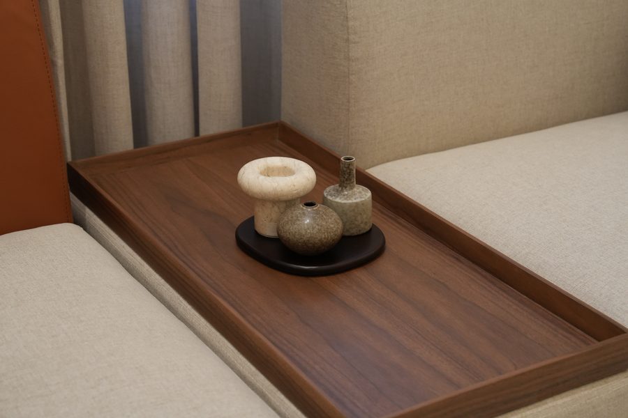 Walnut tray on a cream sofa