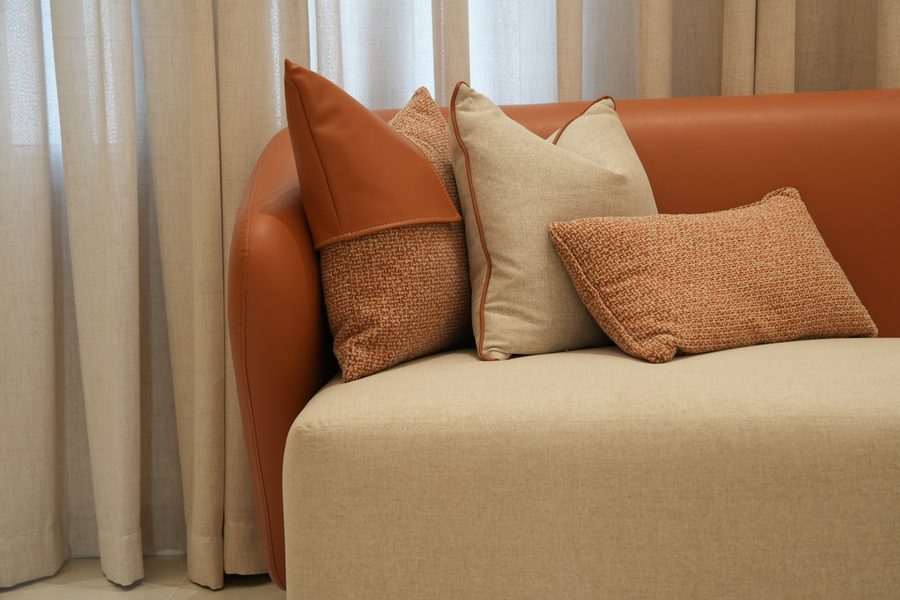 Terracotta-and-cream sofa detail