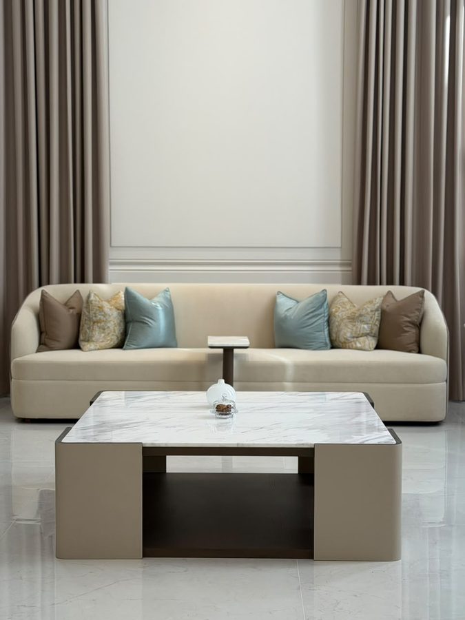 Formal sitting area with a marble coffee table
