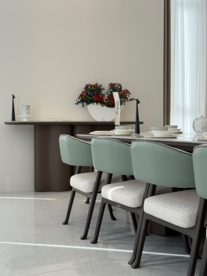 Dining room with sage upholstered chairs